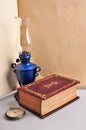 Old book lamp and watch