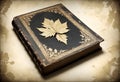 an old book with maple leaves on the cover Royalty Free Stock Photo