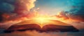 The old book open in front of a sunset sky, thus creating a fantasy, imagination, education, and religion concept. Royalty Free Stock Photo