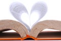 Old book with sheets that form a heart shape Royalty Free Stock Photo