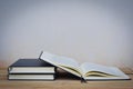 Old book on wood desk. Royalty Free Stock Photo