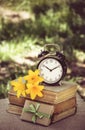 Old books and alarm clock. Back to school concept Royalty Free Stock Photo