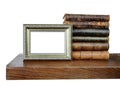 Old books and an antique photo frame Royalty Free Stock Photo