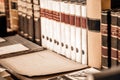 Old books background. Stack of books in a row on o shelf in library. Used books Royalty Free Stock Photo