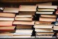 Old books on book shelf background Royalty Free Stock Photo