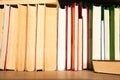 Old books on book shelf background Royalty Free Stock Photo
