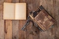 Old books bound by a new shiny chain with an old padlock. Forbidden old works artists on a wooden table Royalty Free Stock Photo