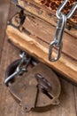 Old books bound by a new shiny chain with an old padlock. Forbidden old works artists on a wooden table Royalty Free Stock Photo