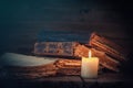 Old books and candle. Royalty Free Stock Photo