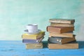 Old books and a cup of coffee. Royalty Free Stock Photo