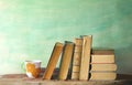 Old books and cup of coffee Royalty Free Stock Photo