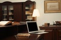 Old books and laptop on wooden table in library reading room Royalty Free Stock Photo