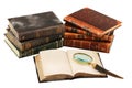 Old books and magnifying glass Royalty Free Stock Photo