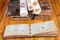 Old books and a notebook on a wooden table. Place of work of an elderly man