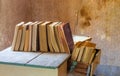 old books on an old table in an old house Royalty Free Stock Photo