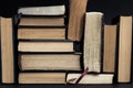 Old books pile on black table Royalty Free Stock Photo