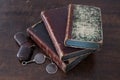 Old books piled on an antique wooden table Royalty Free Stock Photo
