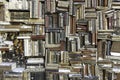 Old books piled on a wall, stacked in a disorderly fashion Royalty Free Stock Photo