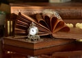 Old books and pocket watch with chain Royalty Free Stock Photo