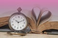 Old books and pocket watches on desk Royalty Free Stock Photo