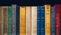 Old Books In A Row In Library On Black Background With Copy-Space Royalty Free Stock Photo