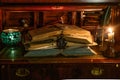 Old books stacked with a pocket watch Royalty Free Stock Photo