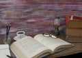 Old books storm lantern coffee cup, compass, glasses and pencil Royalty Free Stock Photo