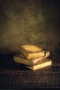 Old books vintage on wood floor and paper aged background or tex Royalty Free Stock Photo