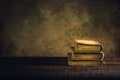 Old books vintage on wood floor and paper aged background or tex Royalty Free Stock Photo