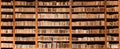 Old books in wooden bookcase Royalty Free Stock Photo