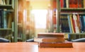 Old books on a wooden table - Book stack in the library room for business and education background , back to school concept Royalty Free Stock Photo