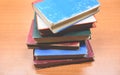 Old books on a wooden table - Open book stack in the library room for business and education wall background , back to school Royalty Free Stock Photo