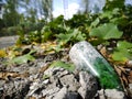 Old bottle on a dry lake bottom