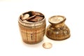 Old bowl filled with coins Royalty Free Stock Photo