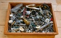 Old box ful of metal nails screws and other Royalty Free Stock Photo