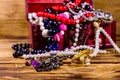 Old box of red wood full of the jewelry. Treasure chest Royalty Free Stock Photo