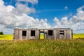 Old Boxcar in Canola Field Royalty Free Stock Photo