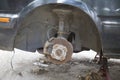 Old brake disc useless with rusty without tire. Royalty Free Stock Photo