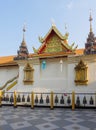 Old brass bell in a row behind the Thai church Royalty Free Stock Photo