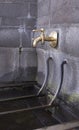 Old brass faucet on sink