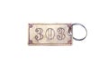 Old brass keychain with 303 number on sign frame isolated on white background , clipping path Royalty Free Stock Photo