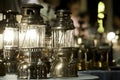 Old brass lamp Use kerosene The combination point on the table at night, the ancient color image.soft focus Royalty Free Stock Photo