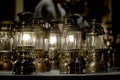 Old brass lamp Use kerosene The combination point on the table at night, the ancient color image.soft focus. Royalty Free Stock Photo