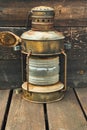 Old brass sailor lantern. Decorative element Royalty Free Stock Photo