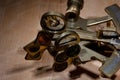 old brass sextant lying on wooden table