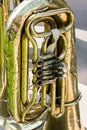 Old brass tuba mechanism. worn valves bass tuba. Royalty Free Stock Photo