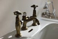 Old brass water tap in the bathroom Royalty Free Stock Photo