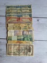 Old Brazil banknotes, out of circulation, obsolete, on a wooden table,