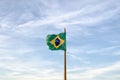 Old Brazilian flag waving on the wind Royalty Free Stock Photo