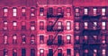 Old brick apartment buildings in the Upper West Side of Manhattan, New York City with pink and blue colors Royalty Free Stock Photo